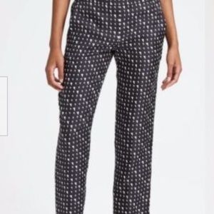 Theory pull on pants with triangle stripe patten.  Size 10 Black and cream color